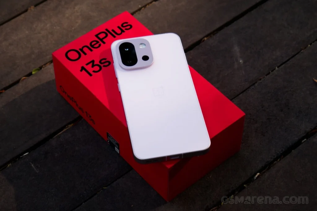 Close-up of the OnePlus 13S showing its sleek matte finish and curved edges