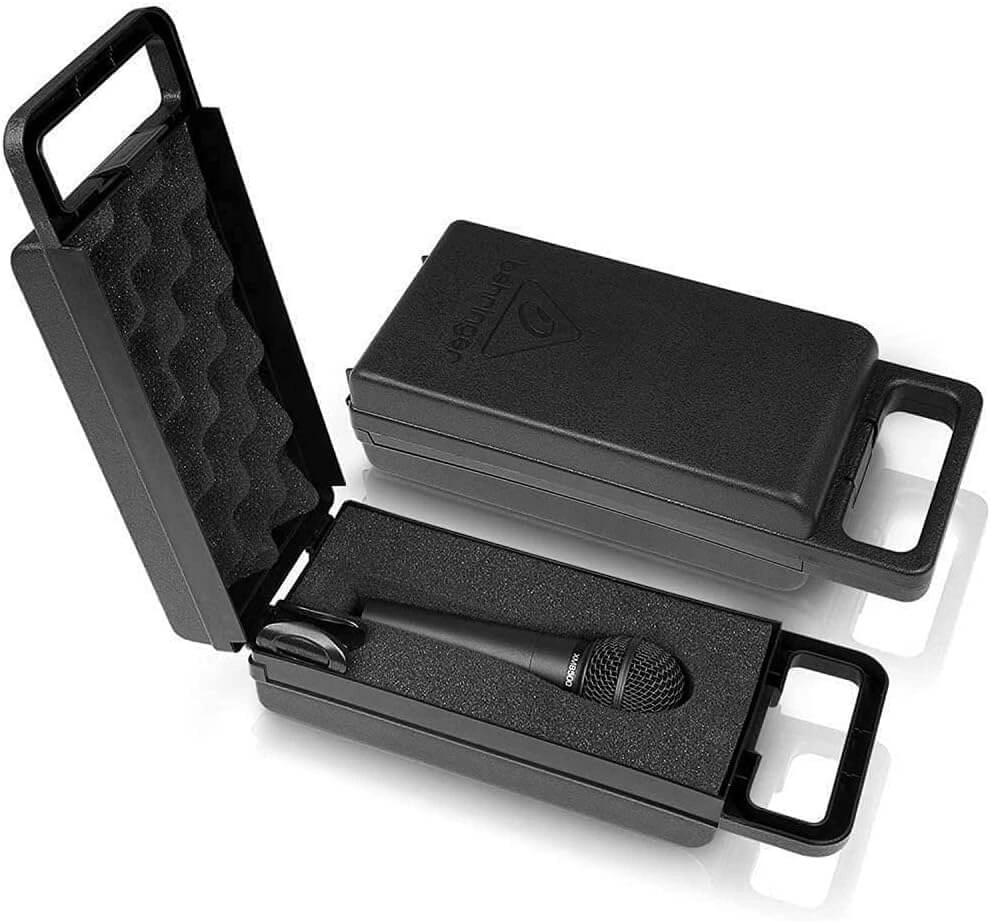 Behringer Ultravoice XM8500 dynamic cardioid vocal microphone on stage with performer