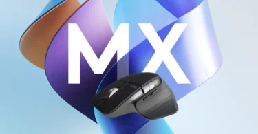 Logitech MX Master 3S Wireless Mouse placed on a modern desk beside a laptop, showcasing its ergonomic design and side scroll wheel.